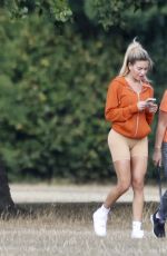 MEGAN BARTON HANSON Make Up Free Out with Her Mum and Dog at a Park in Essex 08/23/2022