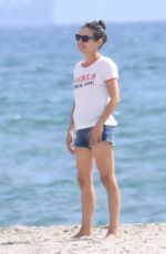 MILA KUNIS Out at a Beach in Santa Barbara 08/11/2022