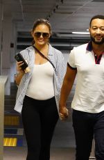 Pregnant CHRISSY TEIGEN and John Legend Arrives at an Office in Beverly Hills 08/08/2022
