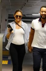 Pregnant CHRISSY TEIGEN and John Legend Arrives at an Office in Beverly Hills 08/08/2022