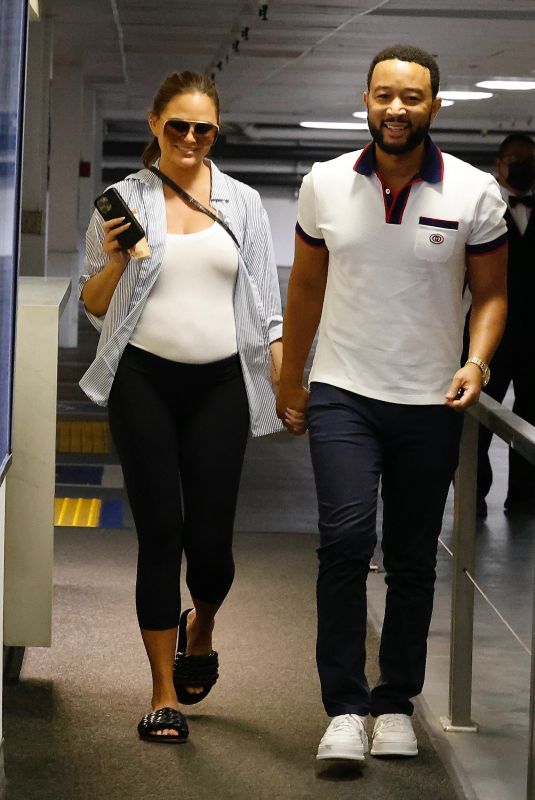 Pregnant CHRISSY TEIGEN and John Legend Arrives at an Office in Beverly Hills 08/08/2022
