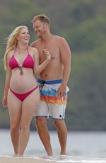 Pregnant HEIDI MONTAG in Bikini and Spencer Pratt at a Beach in Hawaii 08/22/2022