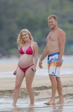 Pregnant HEIDI MONTAG in Bikini and Spencer Pratt at a Beach in Hawaii 08/22/2022