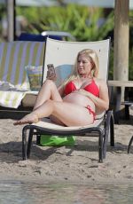Pregnant HEIDI MONTAG in Bikini at a Beach in Hawaii 08/19/2022