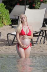 Pregnant HEIDI MONTAG in Bikini at a Beach in Hawaii 08/19/2022