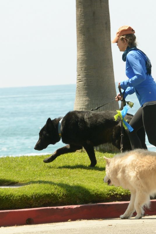 RENEE ZELLWEGER Out with Her Dogs in Laguna Beach 08/25/2022