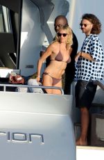 SIENNA MILLER in Bikini at a Boat in Formentera 08/11/2022