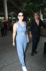 SUNNY LEONE Arrives at Airport in Mumbai 08/24/2022