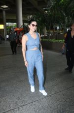 SUNNY LEONE Arrives at Airport in Mumbai 08/24/2022
