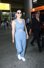 SUNNY LEONE Arrives at Airport in Mumbai 08/24/2022