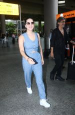 SUNNY LEONE Arrives at Airport in Mumbai 08/24/2022