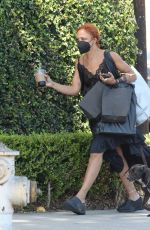 TESSA THOMPSON Out Shopping with Her Dog in Beverly Hills 08/10/2022