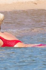VICTORIA SILVSTEDT in a Red Bikini at a Beach in Porto Cervo 08/04/2022