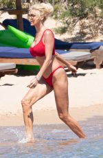 VICTORIA SILVSTEDT in a Red Bikini at a Beach in Porto Cervo 08/04/2022