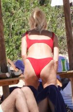 VICTORIA SILVSTEDT in a Red Bikini at a Beach in Porto Cervo 08/04/2022