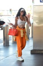 WINNIE HARLOW at LAX Airpor in Los Angeles 08/28/2022