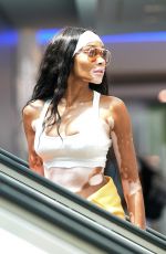 WINNIE HARLOW at LAX Airpor in Los Angeles 08/28/2022