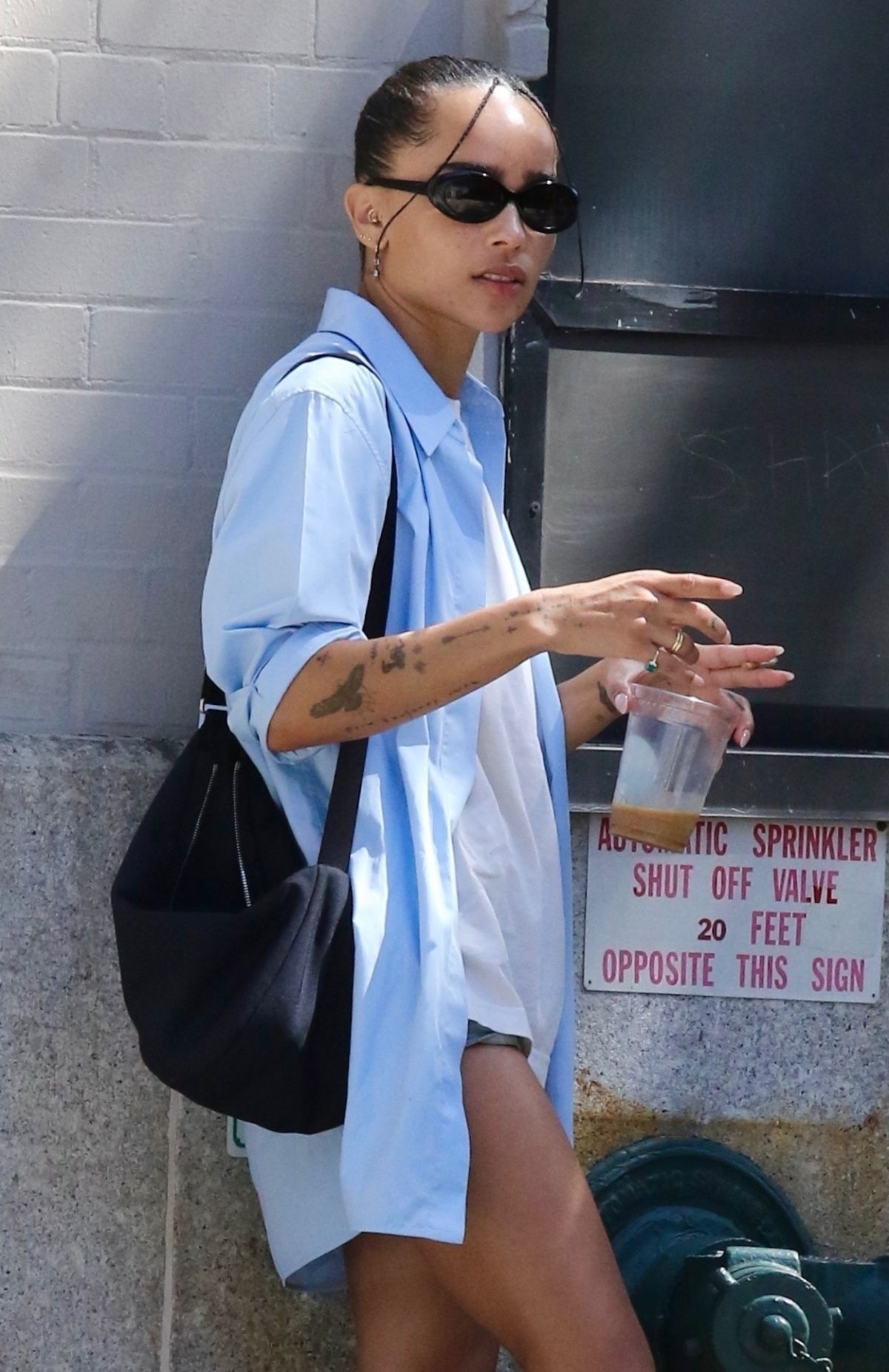 ZOE KRAVITZ Out for Coffee and Smoke in New York 08/30/2022.