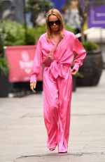 AMANDA HOLDEN in a Pink Jumpsuit Arrives at Heart Radio in London 09/23/2022