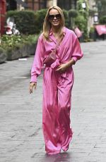 AMANDA HOLDEN in a Pink Jumpsuit Arrives at Heart Radio in London 09/23/2022