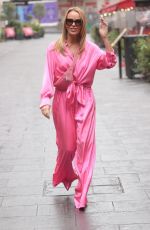 AMANDA HOLDEN in a Pink Jumpsuit Arrives at Heart Radio in London 09/23/2022