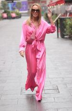 AMANDA HOLDEN in a Pink Jumpsuit Arrives at Heart Radio in London 09/23/2022