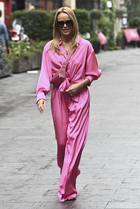 AMANDA HOLDEN in a Pink Jumpsuit Arrives at Heart Radio in London 09/23/2022