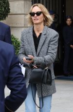 AMBER VALLETTA Catches a Cab Outside a Hotel in Paris 09/29/2022
