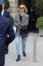 AMBER VALLETTA Catches a Cab Outside a Hotel in Paris 09/29/2022