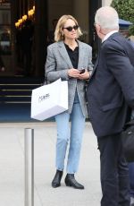 AMBER VALLETTA Catches a Cab Outside a Hotel in Paris 09/29/2022