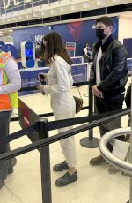 ANA DE ARMAS and Paul Boukadakis at JFK Airport in New York 09/04/2022