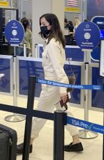 ANA DE ARMAS and Paul Boukadakis at JFK Airport in New York 09/04/2022