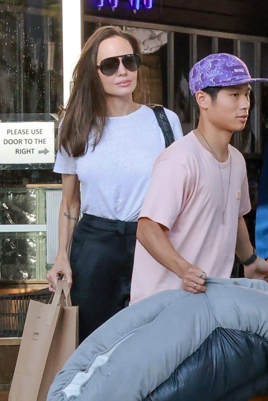 ANGELINA JOLIE at a Pet Store with Her Son Pax in Los Angeles 09/05/2022