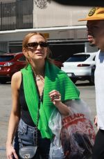 ASHLEE SIMPSON and Evan Ross Leaves Wasteland Clothing Store in Los Angeles 09/24/2022