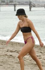 ASHLEY ROBERTS in Bikini on the Beach in Marbella 08/30/2022