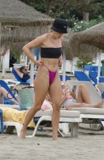ASHLEY ROBERTS in Bikini on the Beach in Marbella 08/30/2022