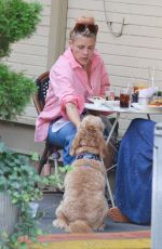 BUSY PHILIPPS Out for Lunch with Her Dog Gina in New York 09/16/2022