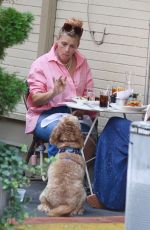 BUSY PHILIPPS Out for Lunch with Her Dog Gina in New York 09/16/2022