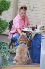 BUSY PHILIPPS Out for Lunch with Her Dog Gina in New York 09/16/2022