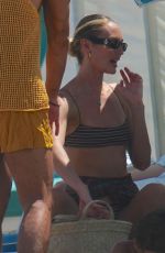 CANDICE SWANEPOEL in Bikini Top at a Beach in Miami 09/17/2022