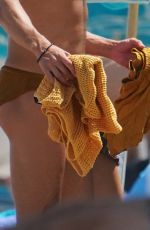 CANDICE SWANEPOEL in Bikini Top at a Beach in Miami 09/17/2022