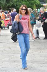 CARLA BRUNI Leaves Venice Aboard a Water Taxi 09/03/2022