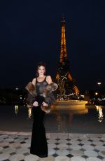 CHARLOTTE LAWRENCE Arrives at Saint Laurent Show at Paris Fashion Week 09/27/2022