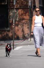 CHRISTY TURLINGTON Out with Her Dog in New York 09/18/2022