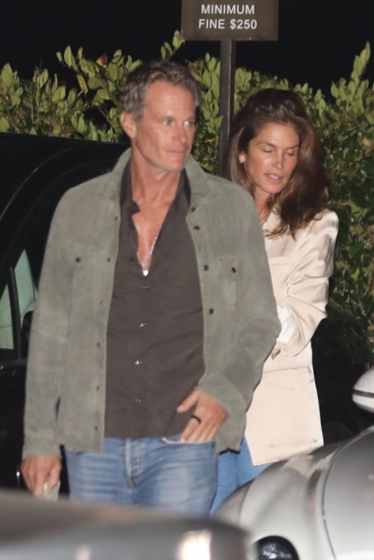 CINDY CRAWFORD and Rande Gerber Arrives at Nobu in Santa Monica 09/23/2022