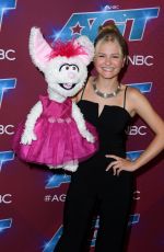 DARCI LYNNE FARMER Arrives at America