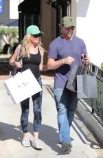 DENISE RICHARDS and Aaron Phypers Shopping at Fred Segal in Malibu 08/31/2022