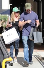 DENISE RICHARDS and Aaron Phypers Shopping at Fred Segal in Malibu 08/31/2022