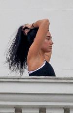 DUA LIPA Gets a Yoga Class on Balcony of Copacabana Palace Hotel in Rio de Janeiro 09/11/2022