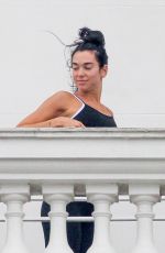 DUA LIPA Gets a Yoga Class on Balcony of Copacabana Palace Hotel in Rio de Janeiro 09/11/2022